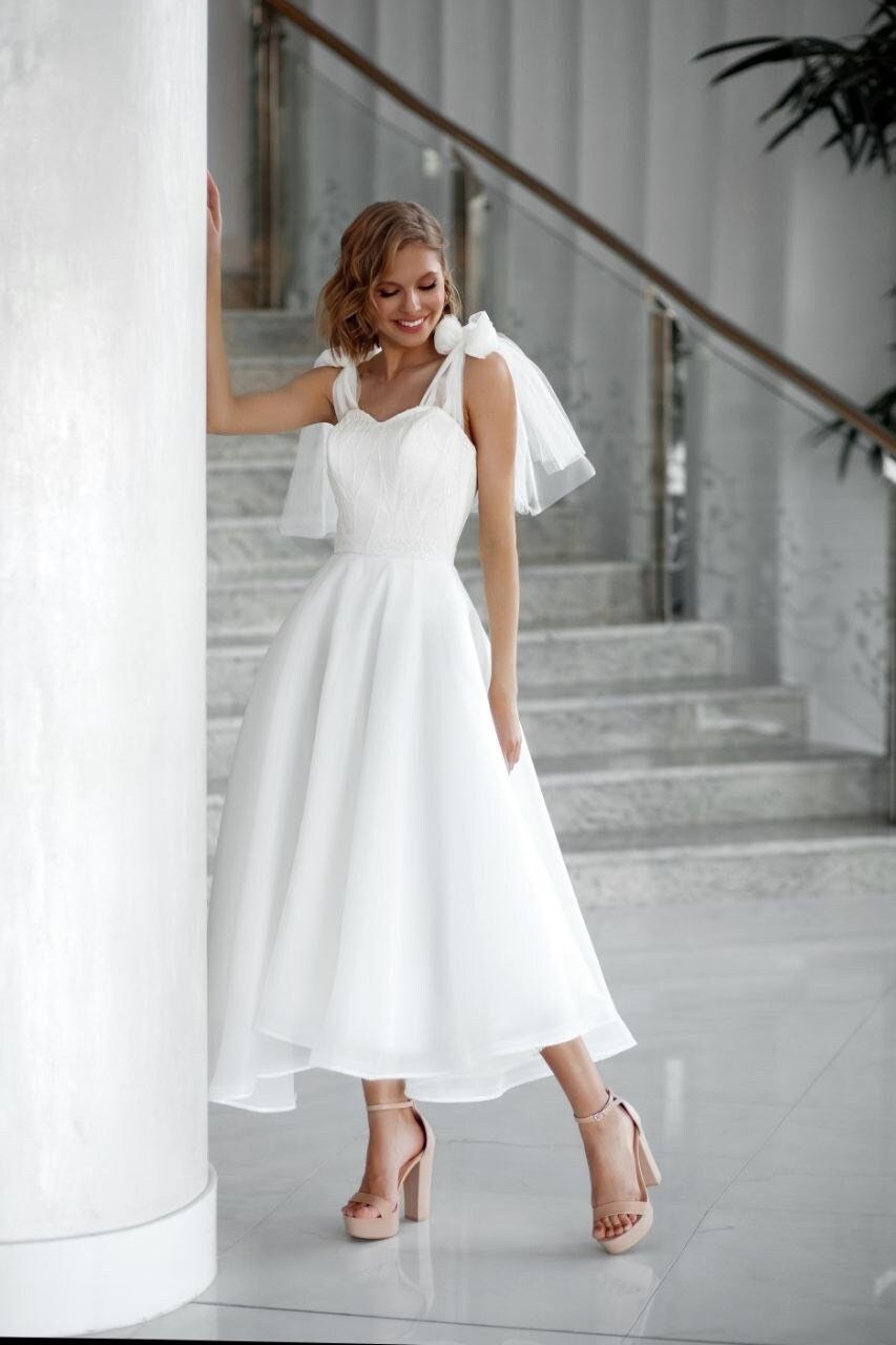 white tea length gown