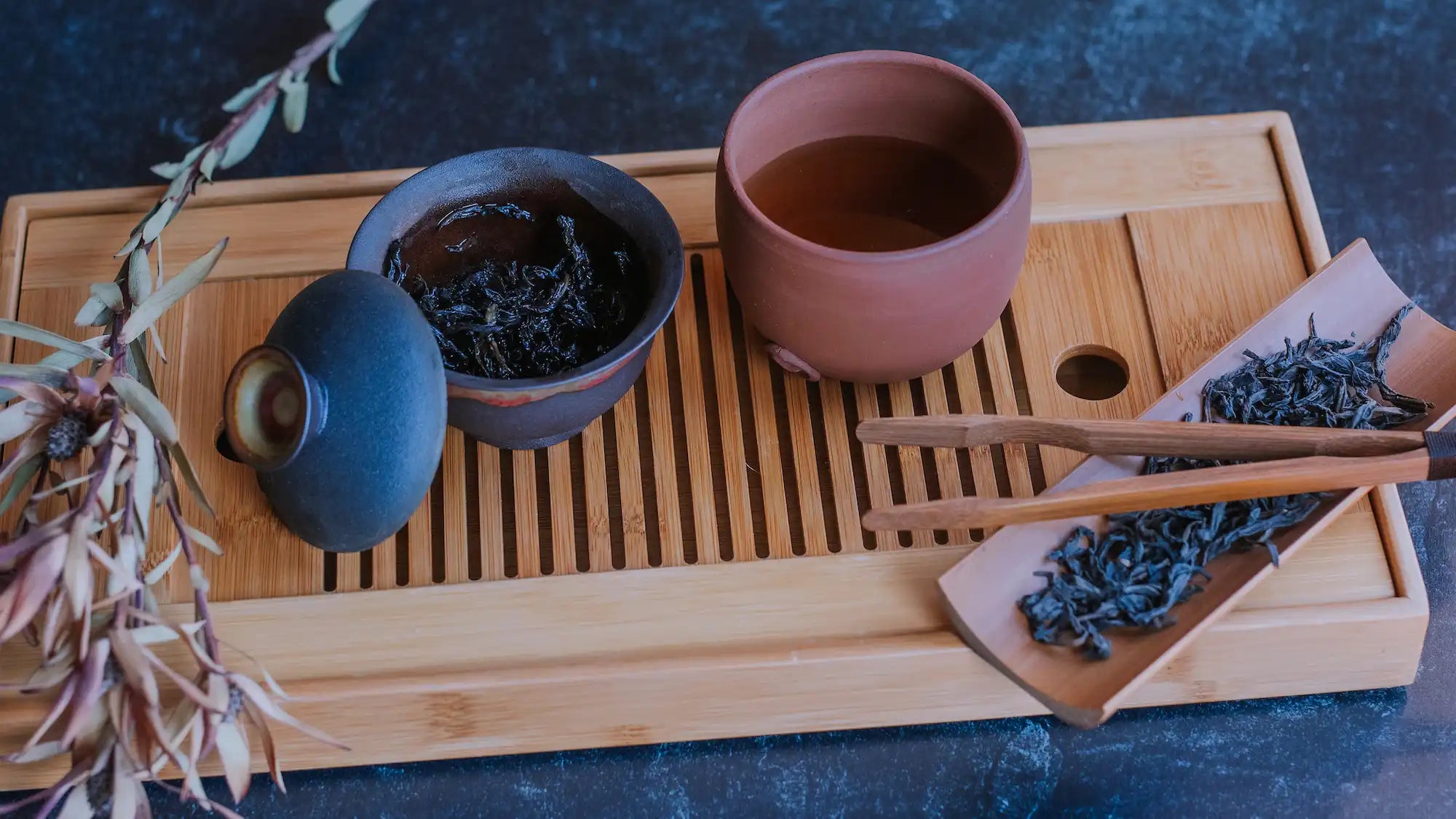 heated like oolong tea leaves crossword clue