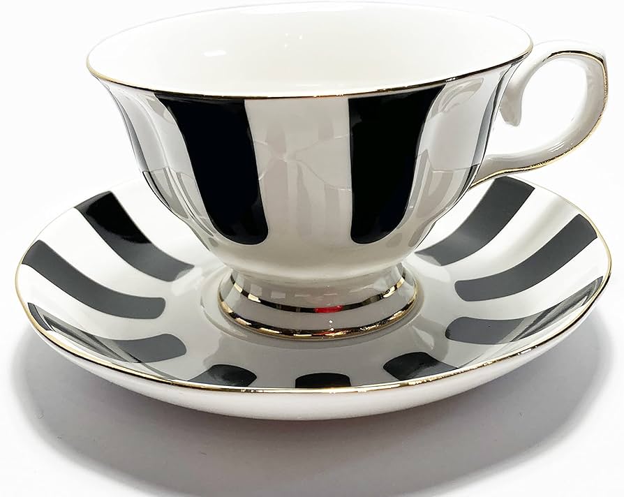 black and white tea cups