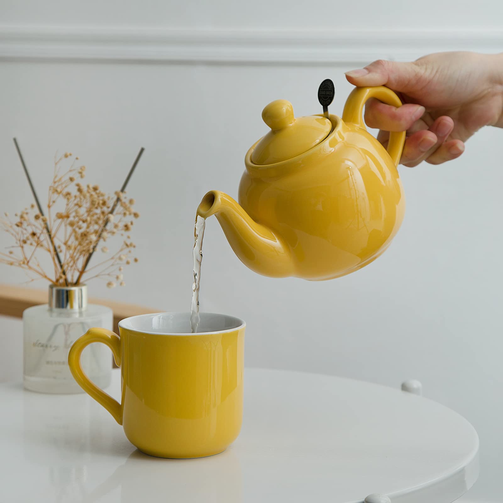 yellow tea pot