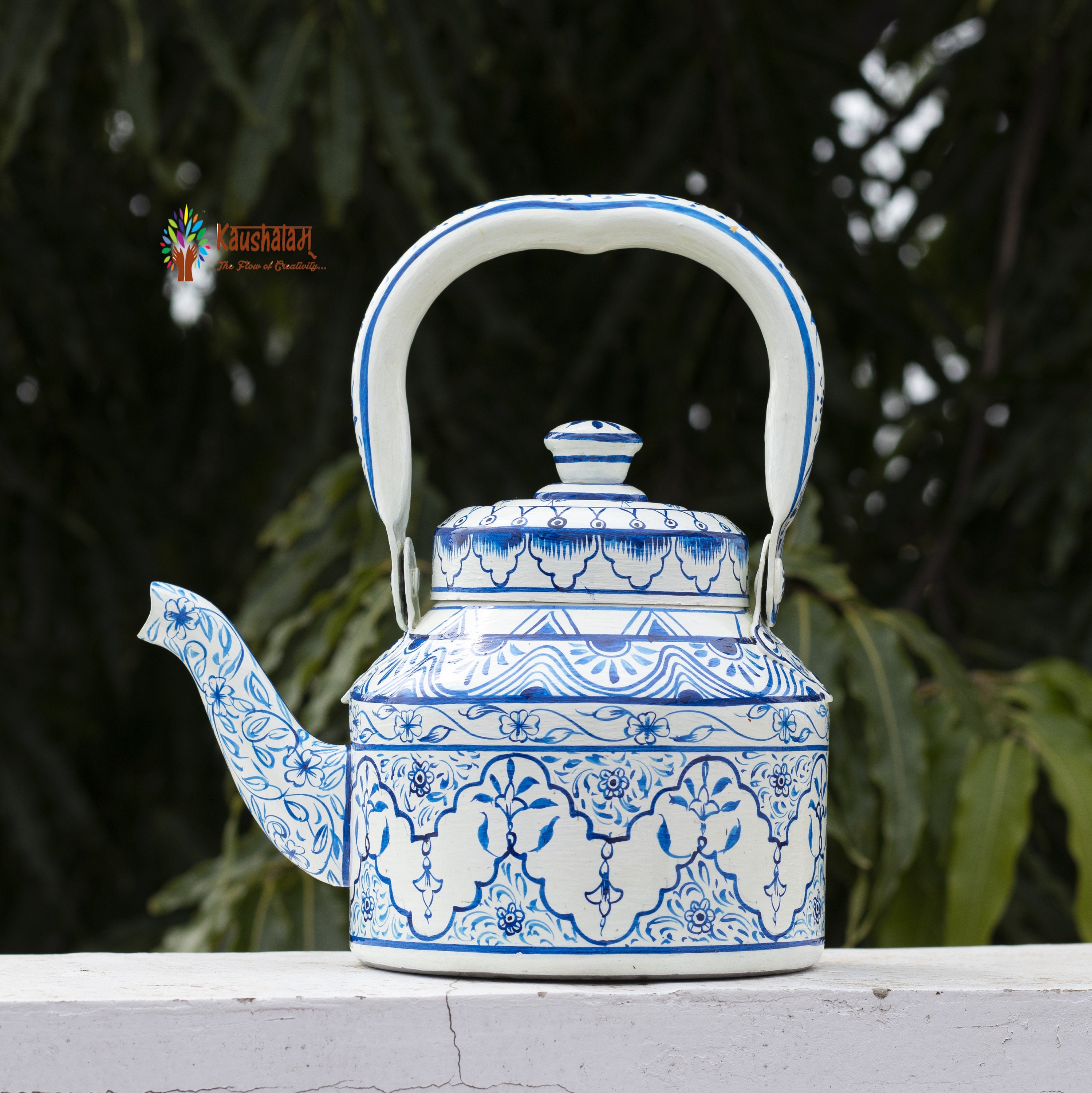 blue and white tea kettle