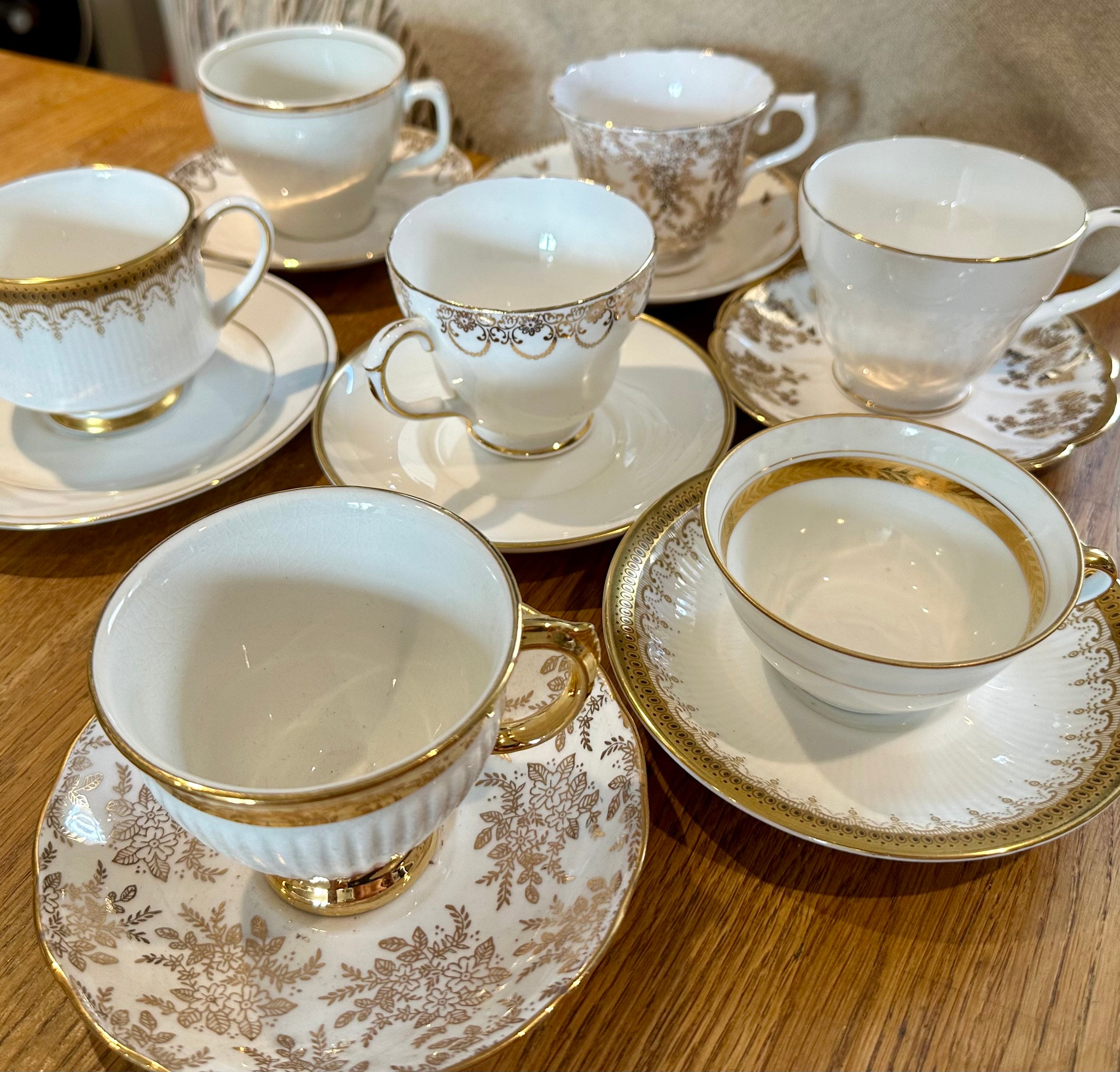 gold and white tea set