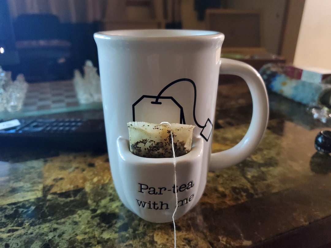 tea mug with tea bag holder