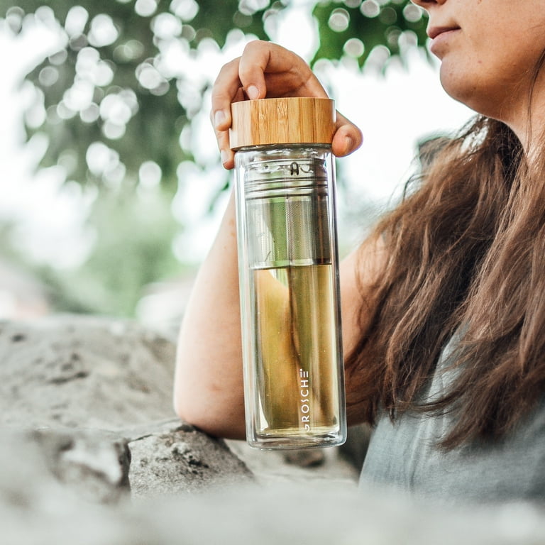 glass water bottle tea infuser nearby