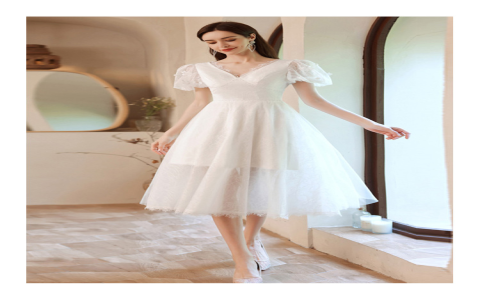 white tea length dress with sleeves