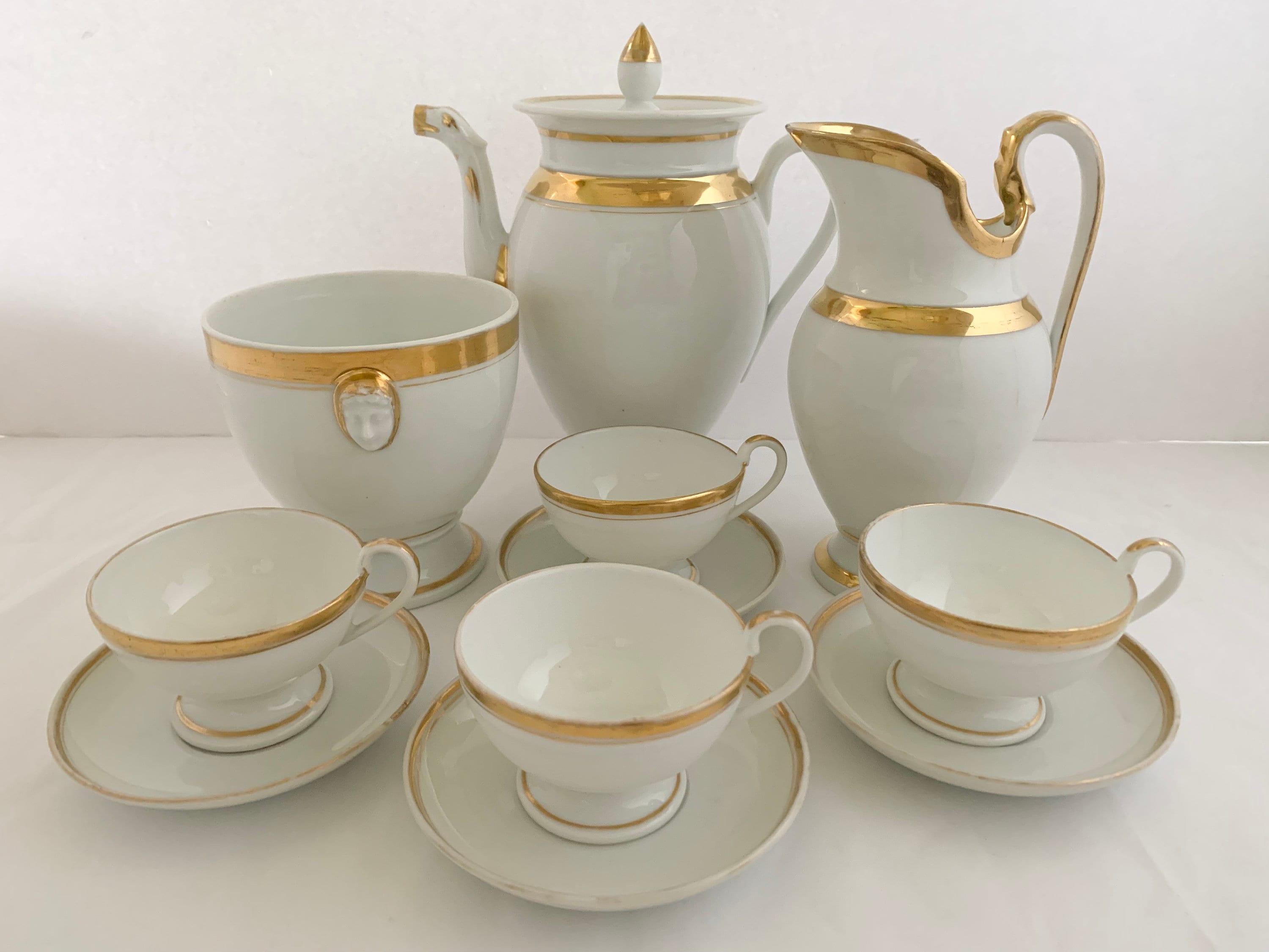 white and gold tea set