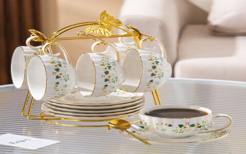 white tea cup and saucer