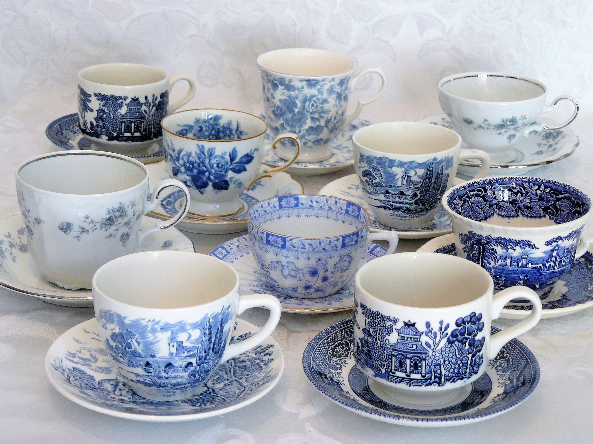 blue and white tea cups and saucers