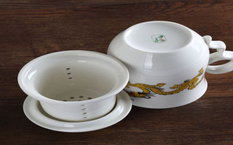 gold and white tea cups